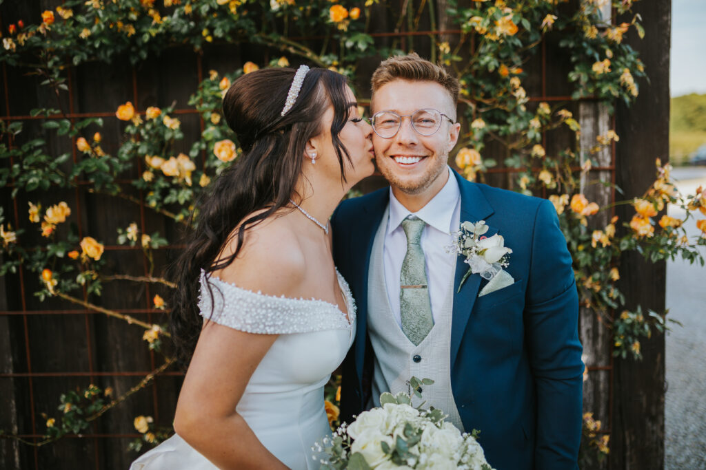 Recently married couple on their wedding day at Hazel Gap Barn, part of the Cripps & Co family. Photograped by Slate Cottage Studio.