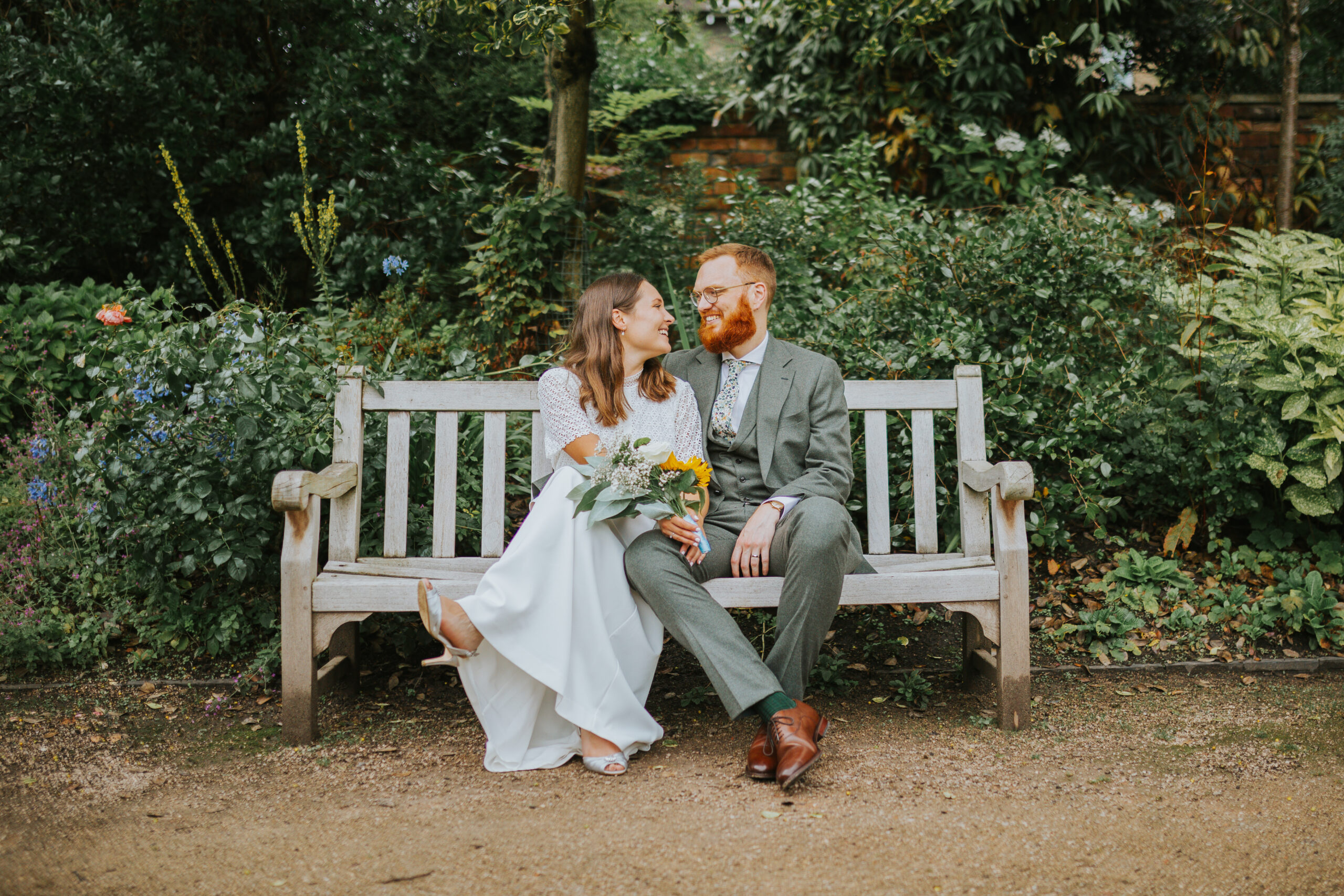 Recently married couple at their small, intimate wedding at The Old Parsonage, Manchester.