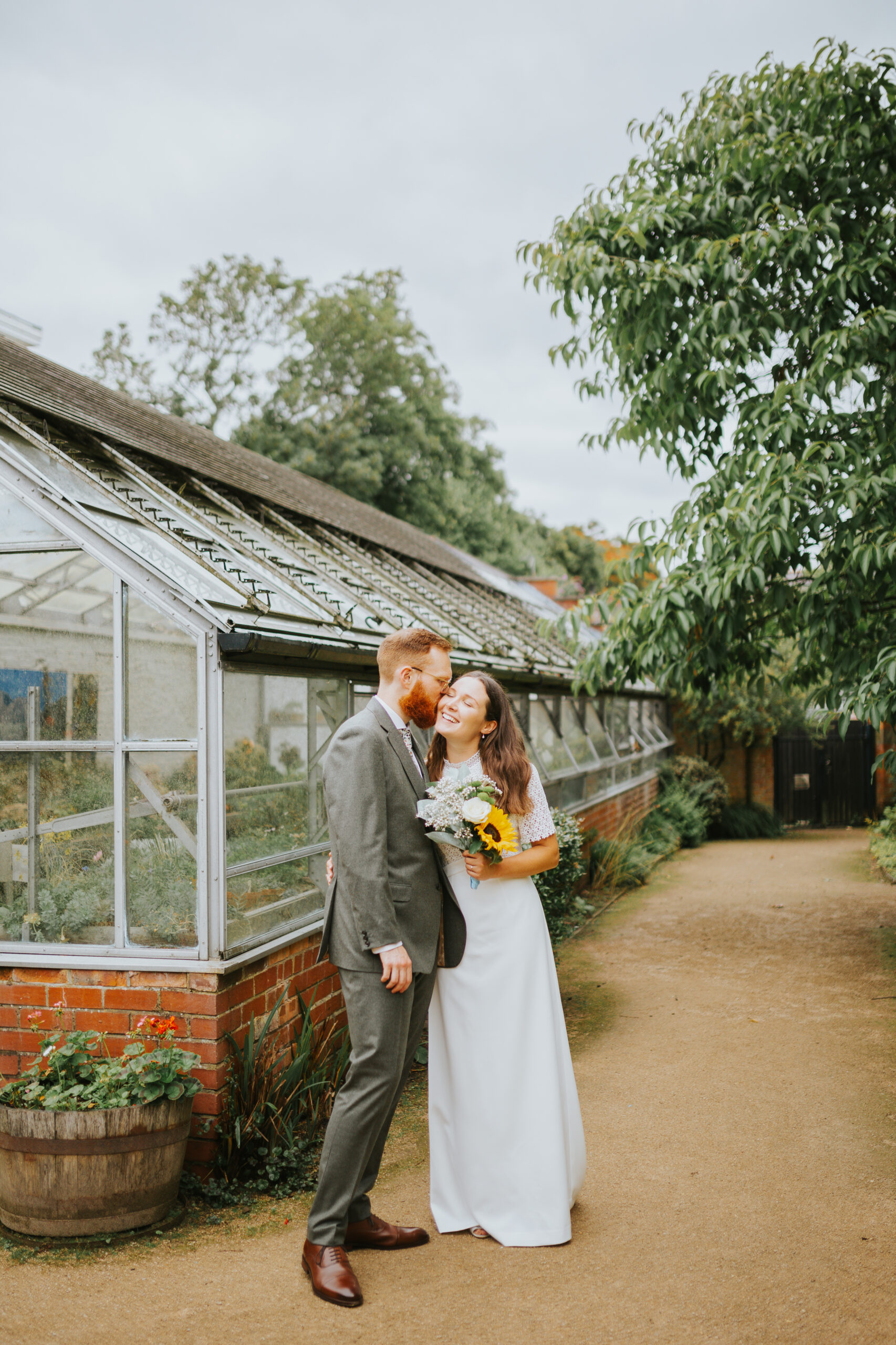 Recently married couple at their small, intimate wedding at The Old Parsonage, Manchester.